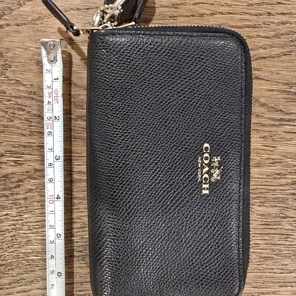 Coach Black Leather Wallet with Gold-Tone Hardware and Textured Finish